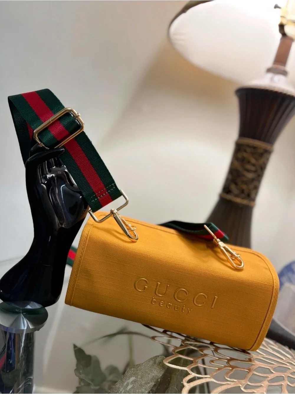 Gucci mustards yellow cylinder from beauty collection.